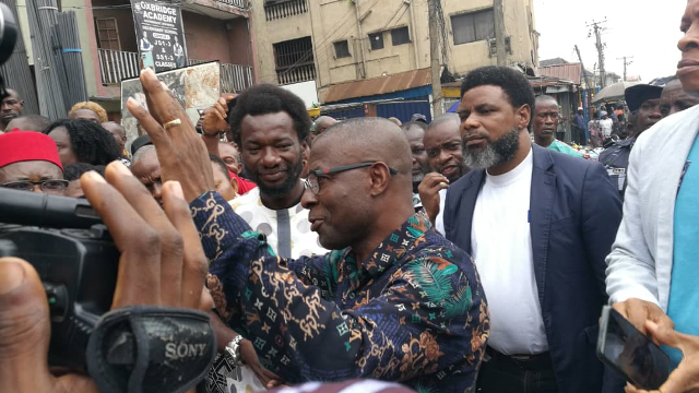 Dr. Chimezie Ukegbu greeting Ariaria traders.